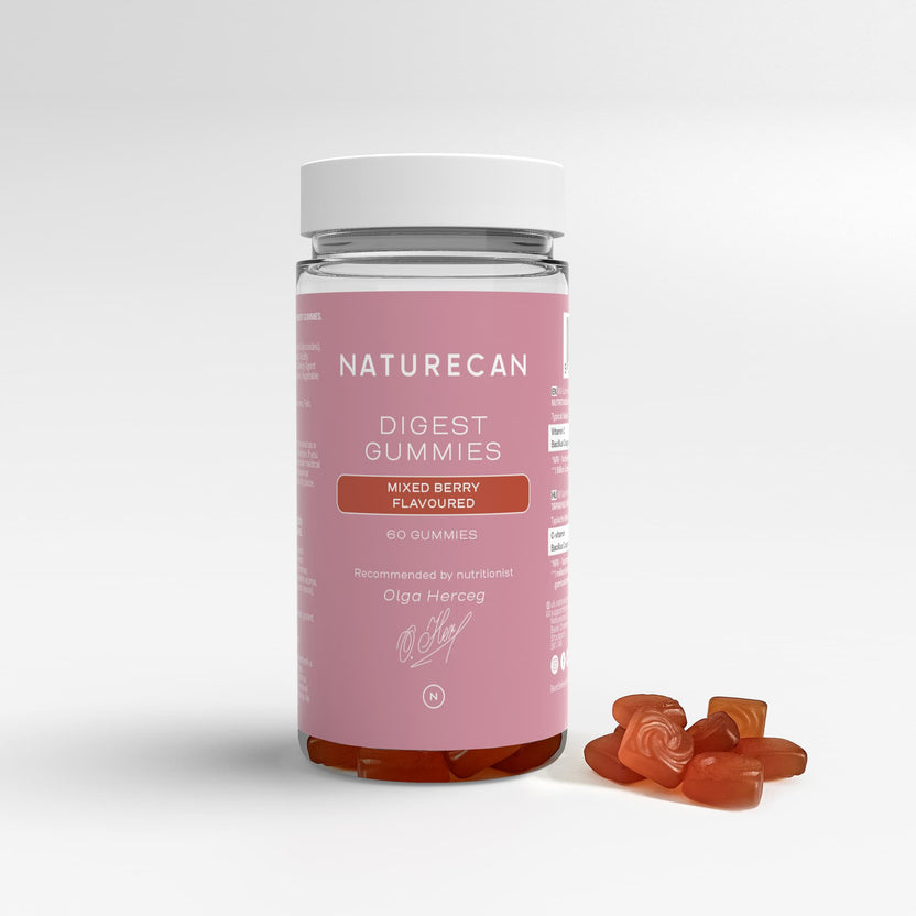 Three bottles of Naturecan supplements: Digest Gummies, Apple Cider Vinegar Gummies, and Active Curcumin, part of the Gut Health Bundle